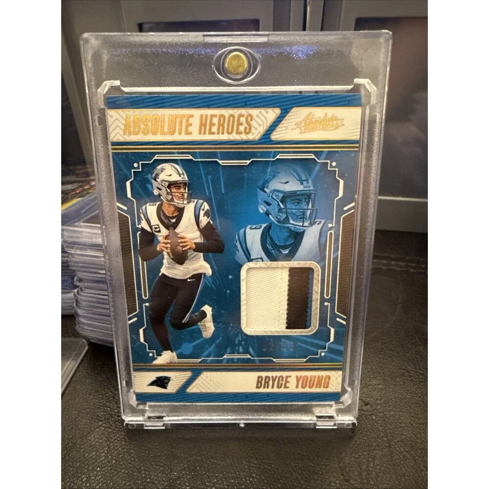 2024 Panini Absolute - Absolute Heroes Memorabilia Gold #AHM-BYG Bryce Young /99